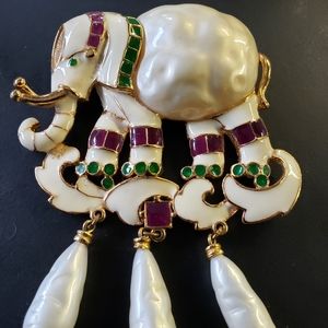 Vintage signed Hattie Carnegie elephant brooch/necklace. 2 Sold on eBay for$425.